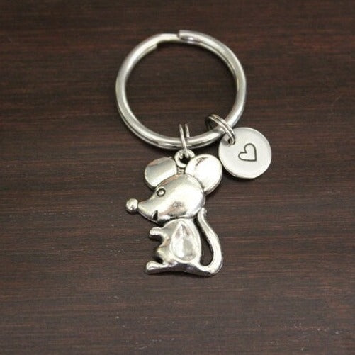 mouse or rat with long tail and big ears keychain