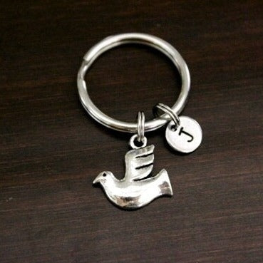 flying dove keychain profile view